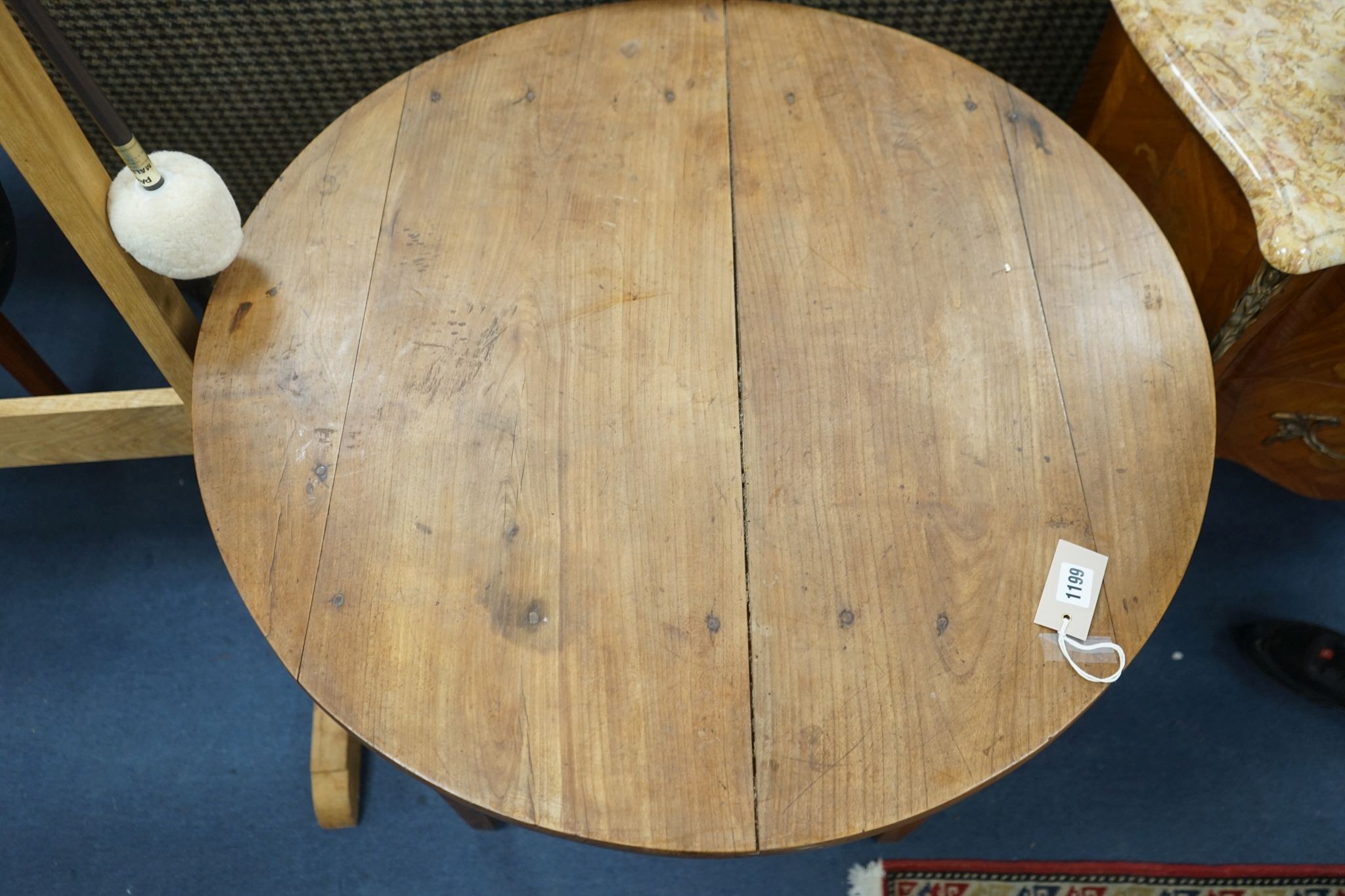 A 19th century French provincial circular cherry tea table, diameter 81cm, height 72cm